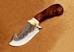 skinner_scrolled_blade_heavy_relief